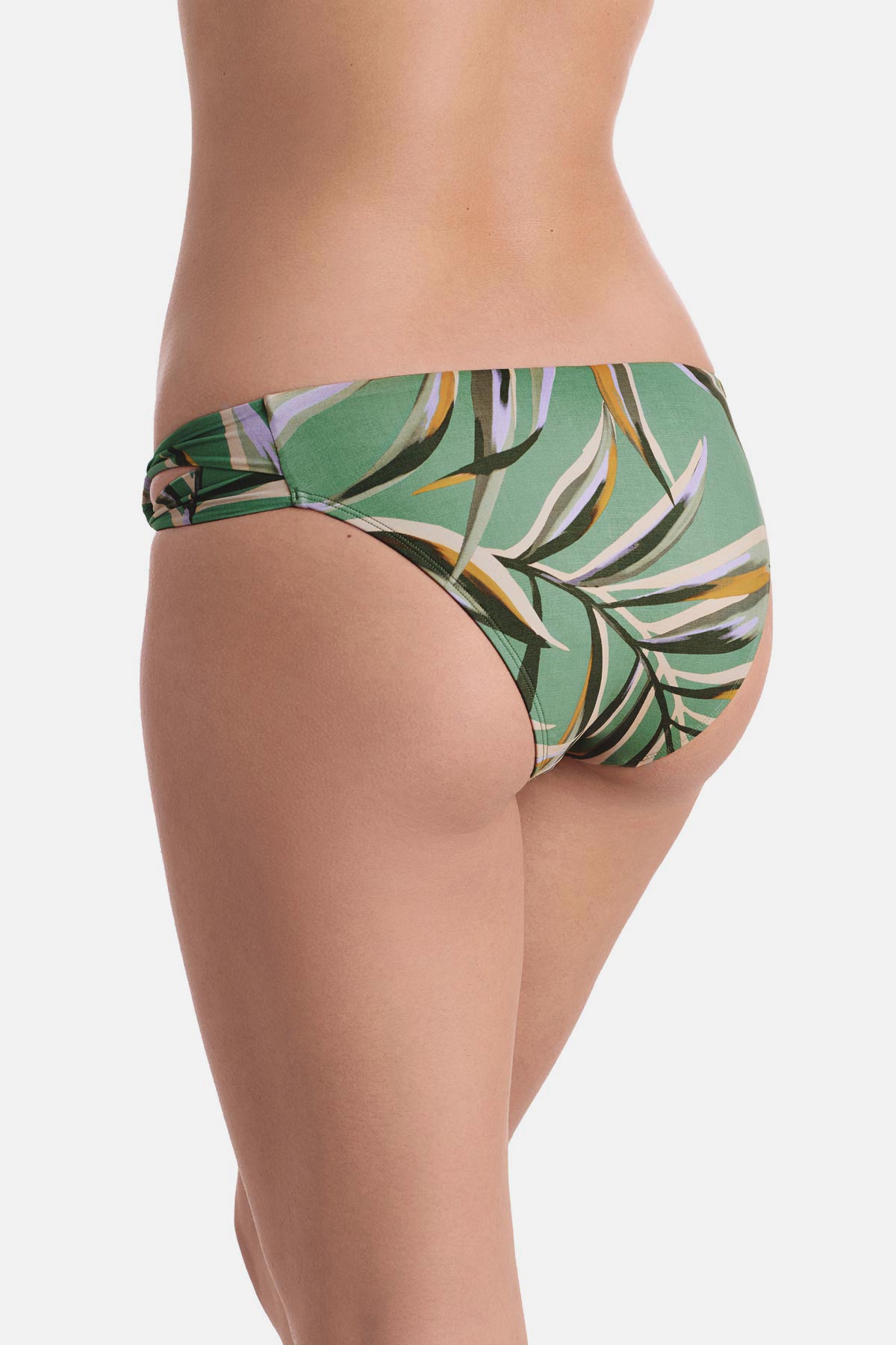 Back view of multicolored leaf printed swim bottoms with side cutouts 